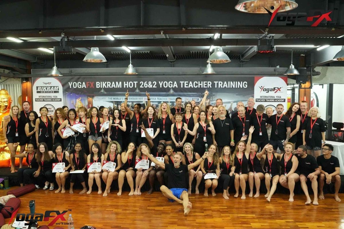 Graduates of the YogaFX Bikram yoga instructor course holding dual RYT 200 and Bikram Hot 26&2 certificates