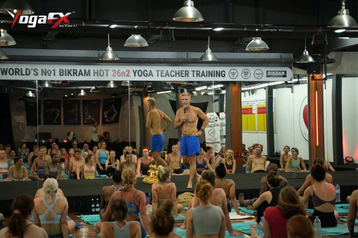 Yoga instructor demonstrating a pose during a Hot 26 and 2 class in London